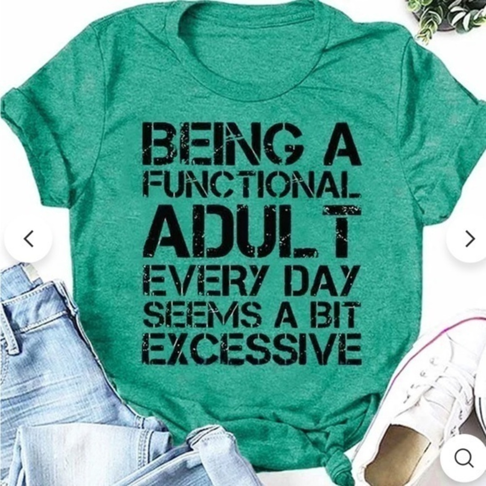 Teal T-shirt that says being a functional adult every day seems a bit excessive